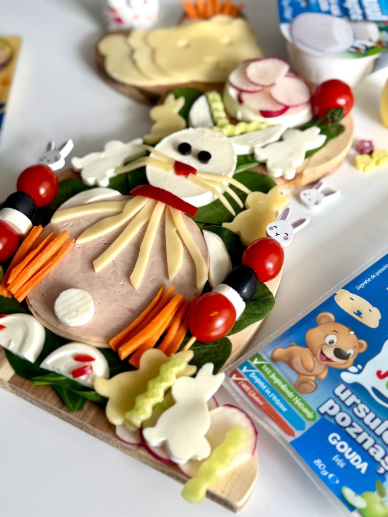 idee creativă de platou de Paște pentru copii cu iepurași din brânză și legume colorate